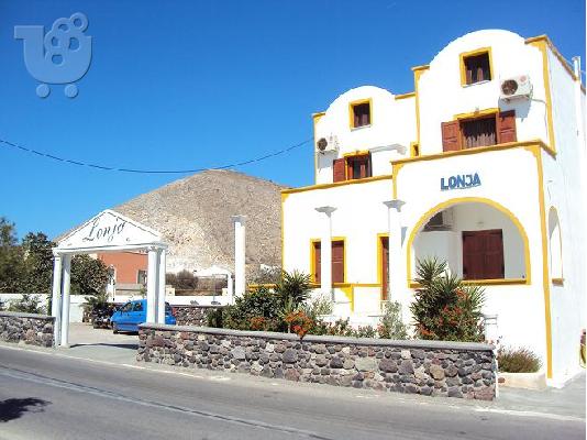 Отели на побережье Квартиры номеров Lonja Studios Santorini Перисса Греции...